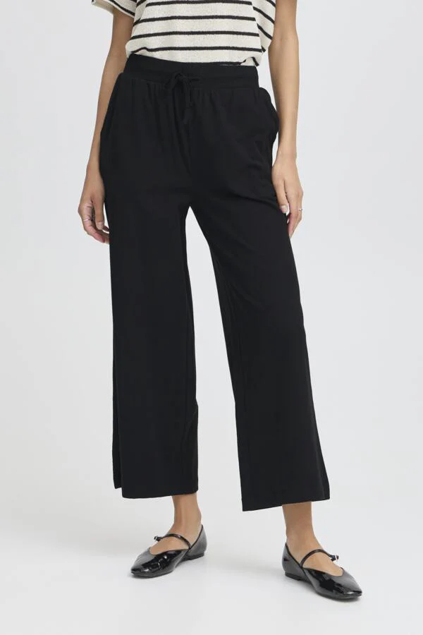 PANDINNA Cotton Ankle Trousers in Black - Image 7